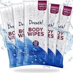 Five sealed packs of 12 Drench body wipes with aloe vera, chamomile and vitamin E, shown with a splash of water