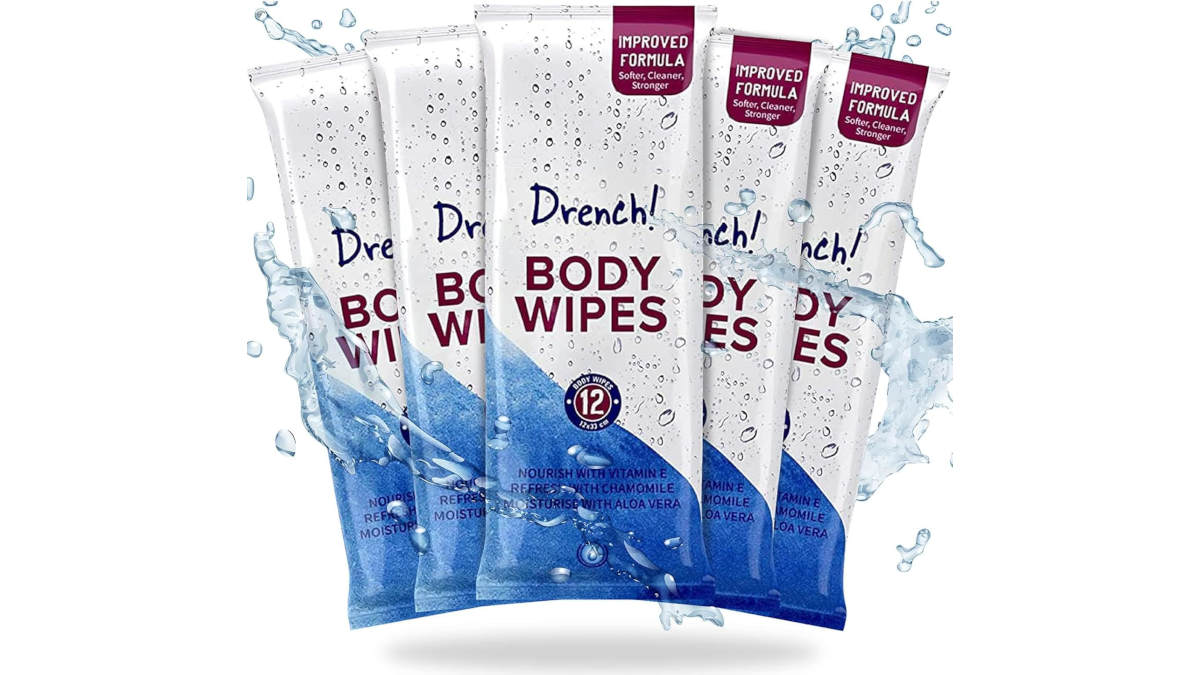 Five sealed packs of 12 Drench body wipes with aloe vera, chamomile and vitamin E, shown with a splash of water